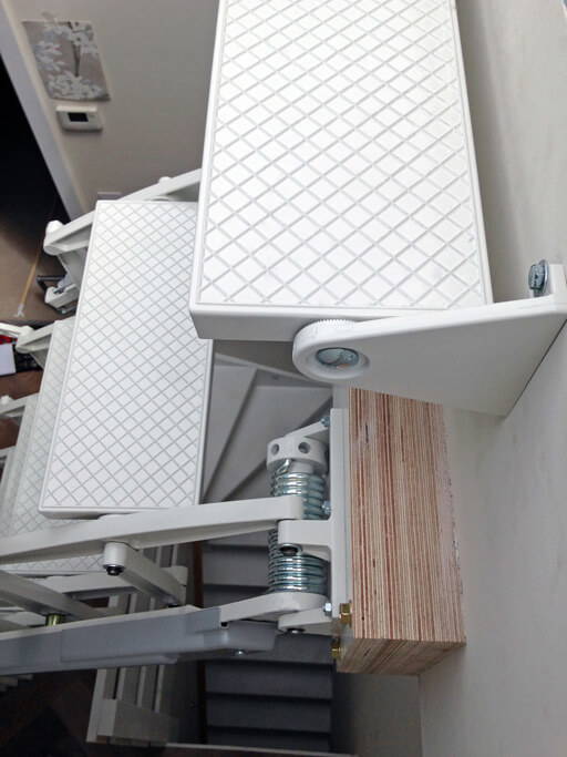 Elite loft ladder for access to rooflight. Wide and deep treads for comfort and safety.