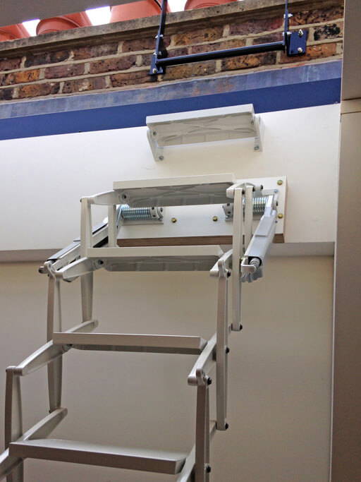 Elite loft ladder for access to rooflight. Grey white powder coat finish to match the decor.