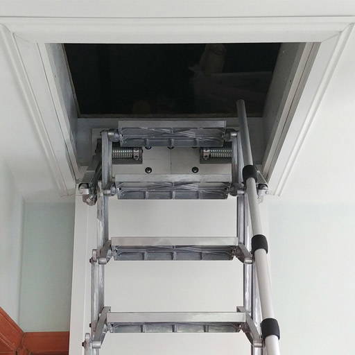 The Elite is installed above the existing loft hatch - Premier Loft Ladders case study