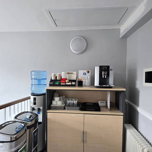 Compact, fire-rated loft ladder installed in Grade II listed office building.