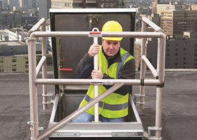 Bilco Ladder-Up Post in use. View from rooftop.