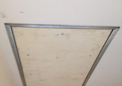 Escalmatic automatic loft ladder installed. In closed position.