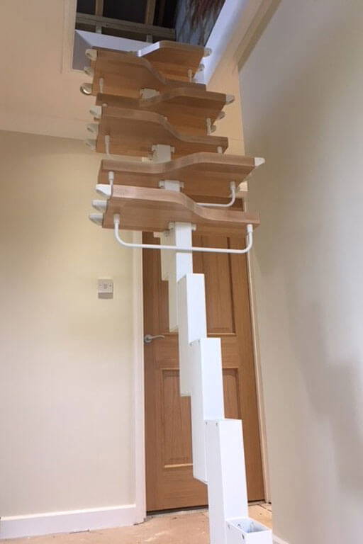 Compatta loft conversion stairs being assembled. Premier Loft Ladders